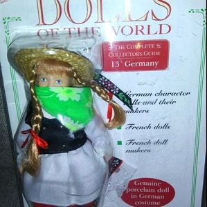 Genuine Porcelain Doll In German costume